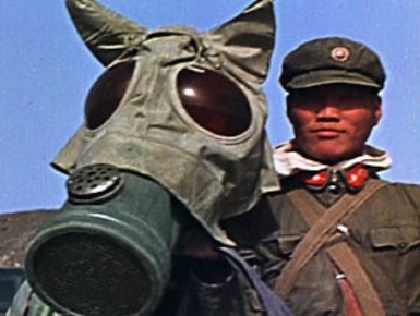 Chinese soldier and his horse prepare to participate in exercises during a nuclear test